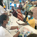 Top-Up Pharmacy organises health screening in Kasoa